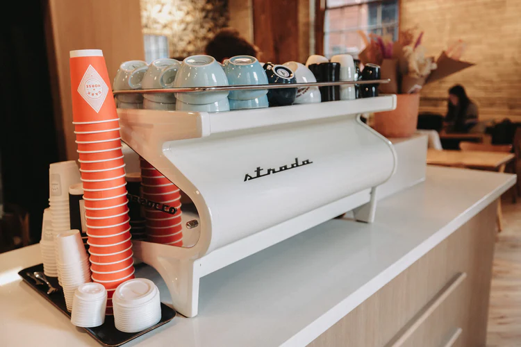 Dark Horse Espresso Bar Richmond St. | A white espresso machine | Homes Almanac