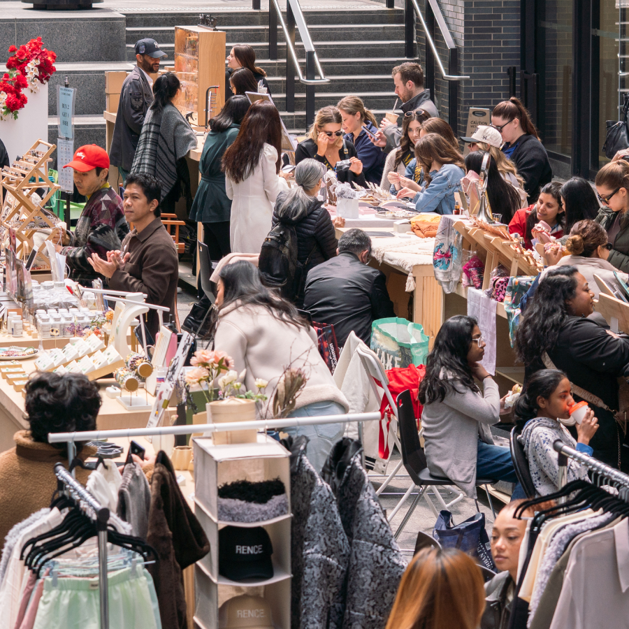 The Well Toronto | People browsing at an artisan pop up market | Homes Almanac