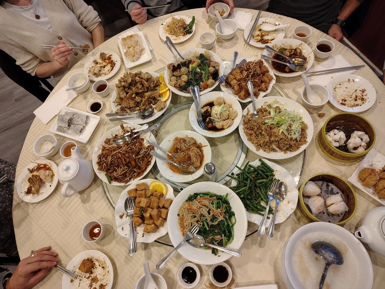 Sun Bo Kong Vancouver | Overhead shot of a dining table full of food | Homes Almanac
