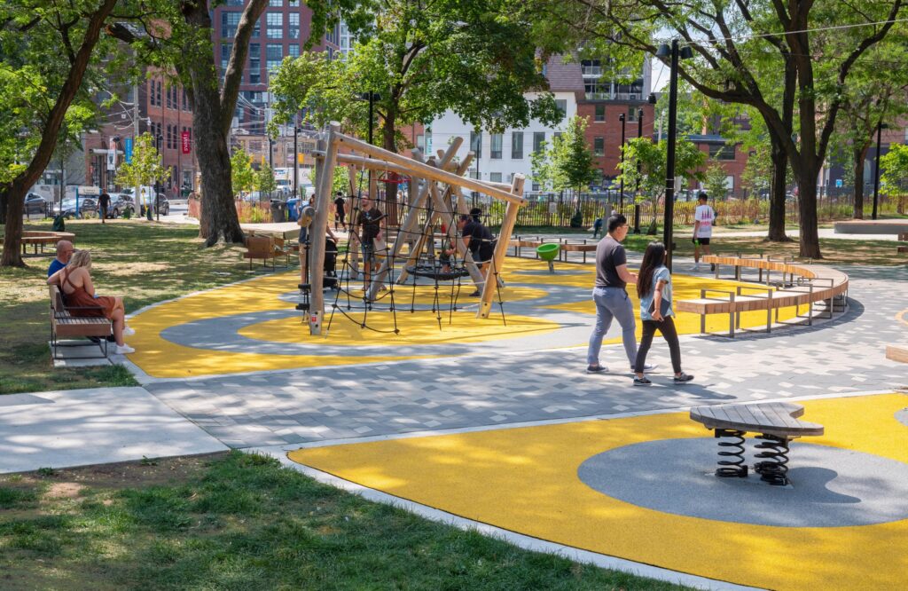 Historic Downtown Toronto Park | Parents and children playing in the park | Homes Almanac