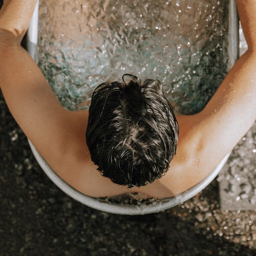 Tality Wellness | Man in cold plunge pool | Homes Almanac