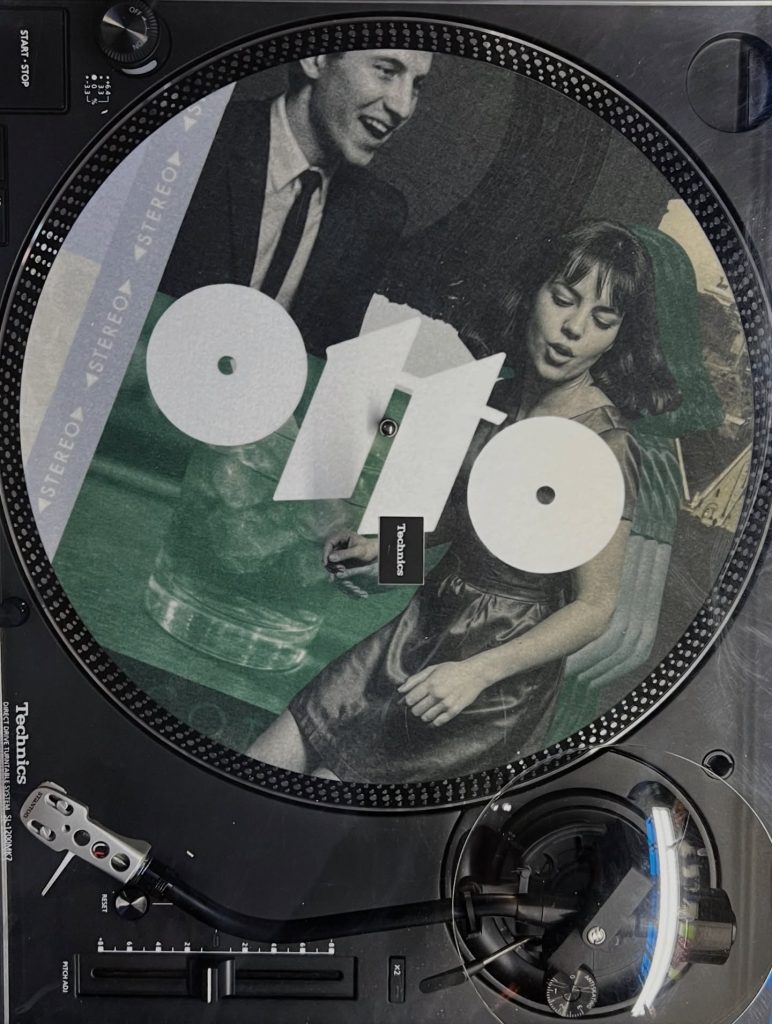 A vinyl record with Osteria Otto's logo on it  | Osteria Otto Mount Pleasant | Homes Almanac