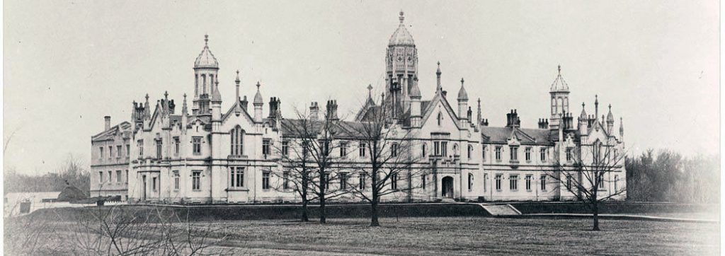 history of trinity bellwoods and ossington | Historic black and white image of Trinity College in the 1800s a gothic revival style building | Homes Almanac