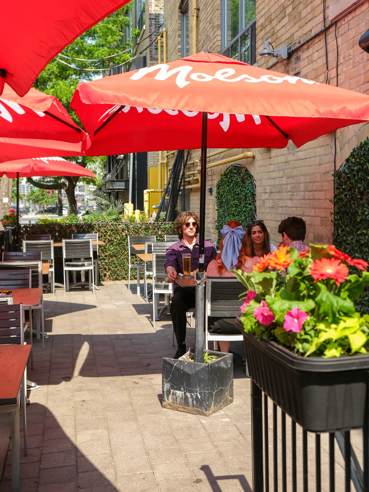 where to watch fifa world cup | A sunny outdoor patio with red sun umbrellas | Homes Almanac